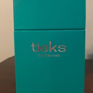 Tieks box, tote, and pink flower.